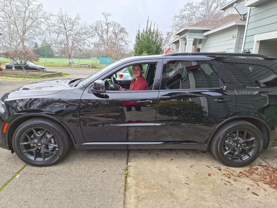 A happy CarEdge buyer with their new 2026 Dodge Durango